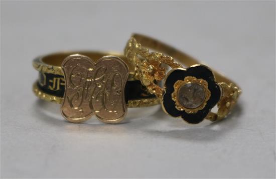 Two Victorian 18ct gold and black enamel mourning rings,